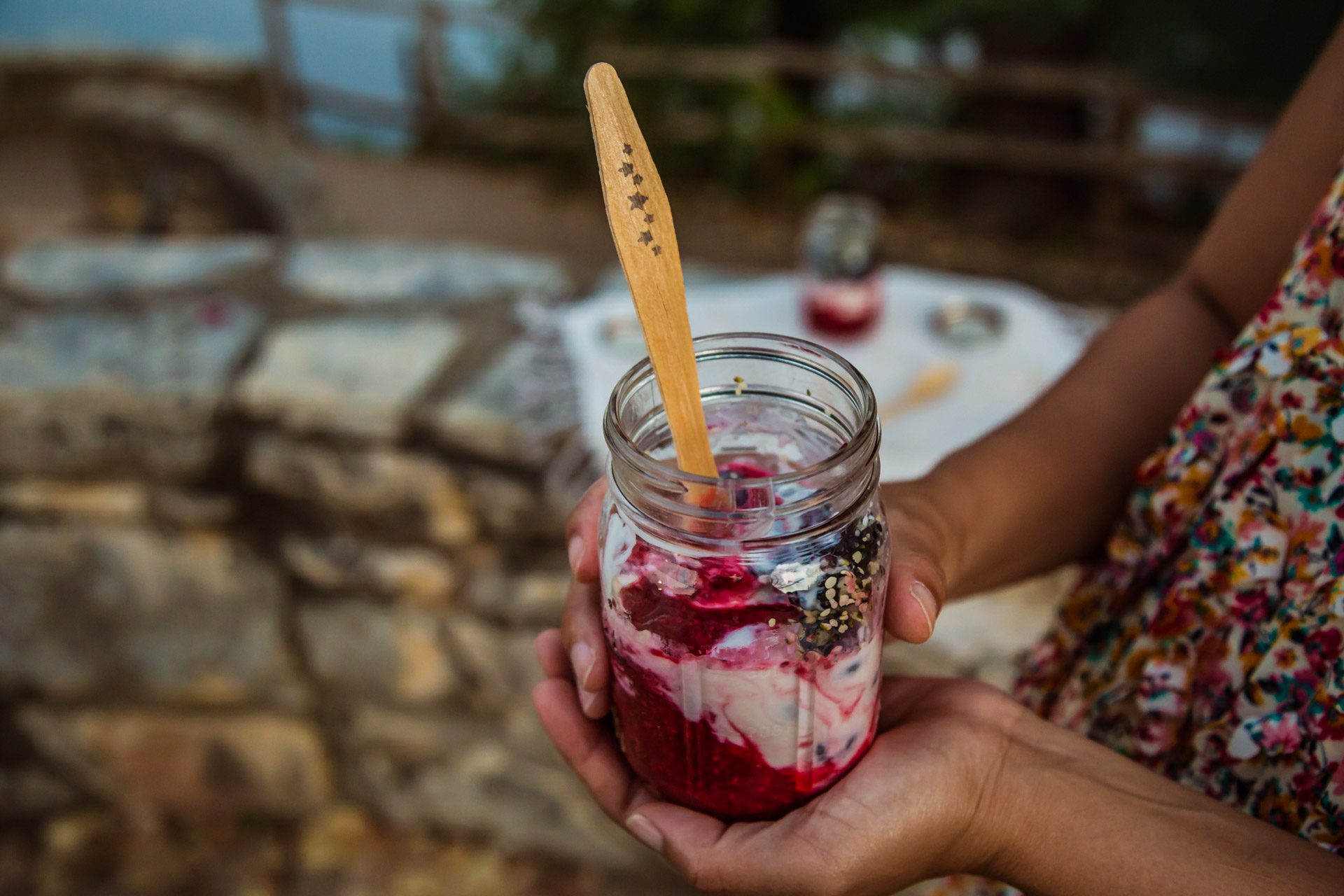 Chia Raspberry Yogurt Jar (angle hands)