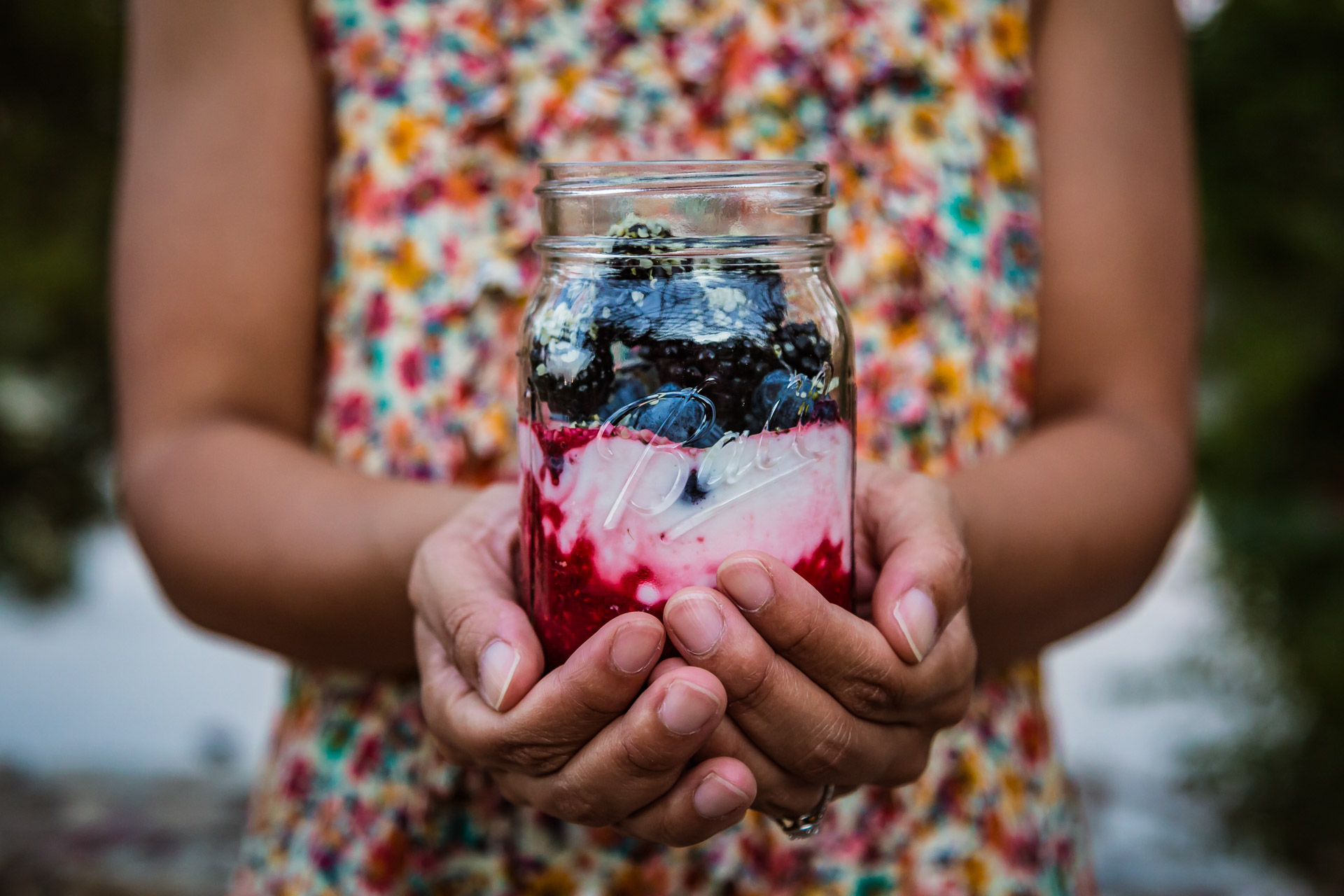 Chia Raspberry Yogurt Jar (front hands)